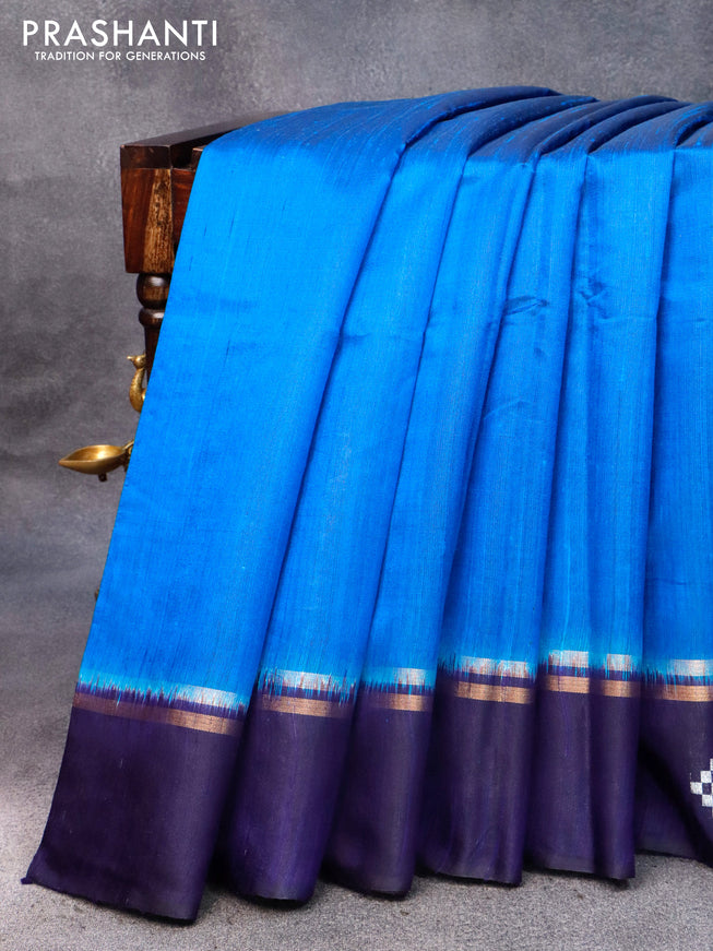 Pure dupion silk saree cs blue and blue with plain body and zari woven butta border