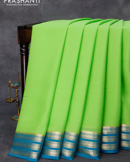 Pure mysore crepe silk saree light green and peacock green with plain body and zari woven border