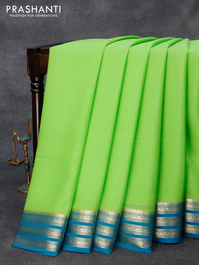 Pure mysore crepe silk saree light green and peacock green with plain body and zari woven border