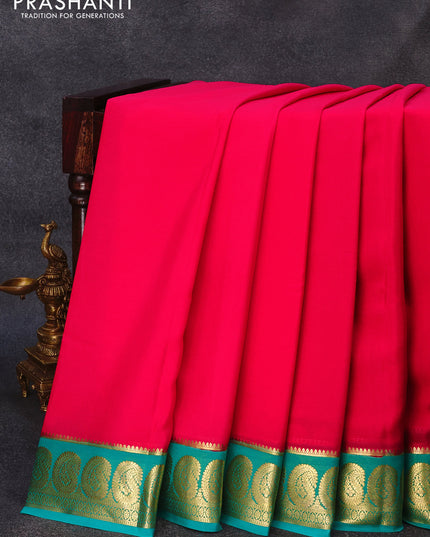 Pure mysore crepe silk saree pink and teal green with plain body and paisley zari woven border