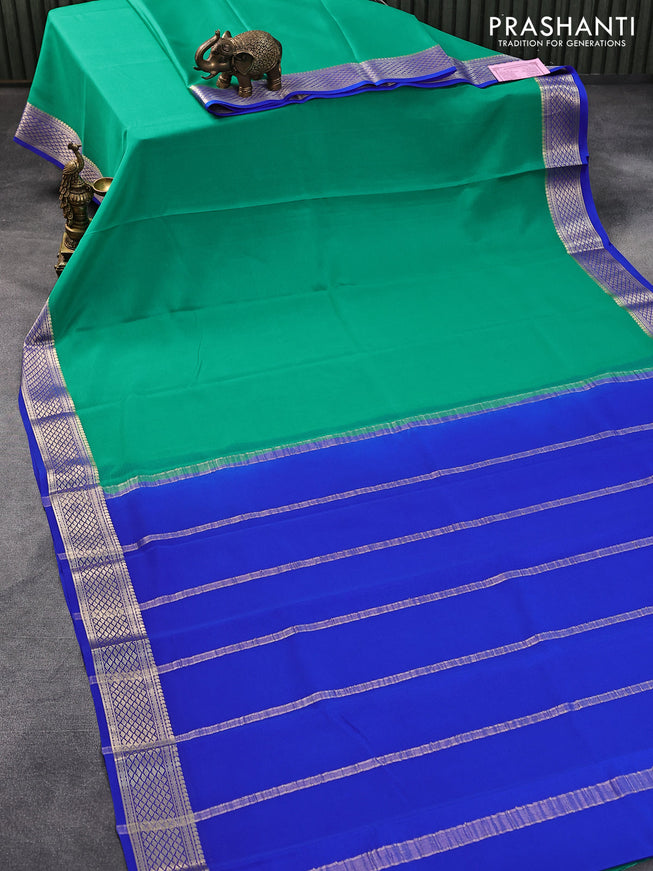 Pure mysore crepe silk saree teal green and royal blue with plain body and zari woven border