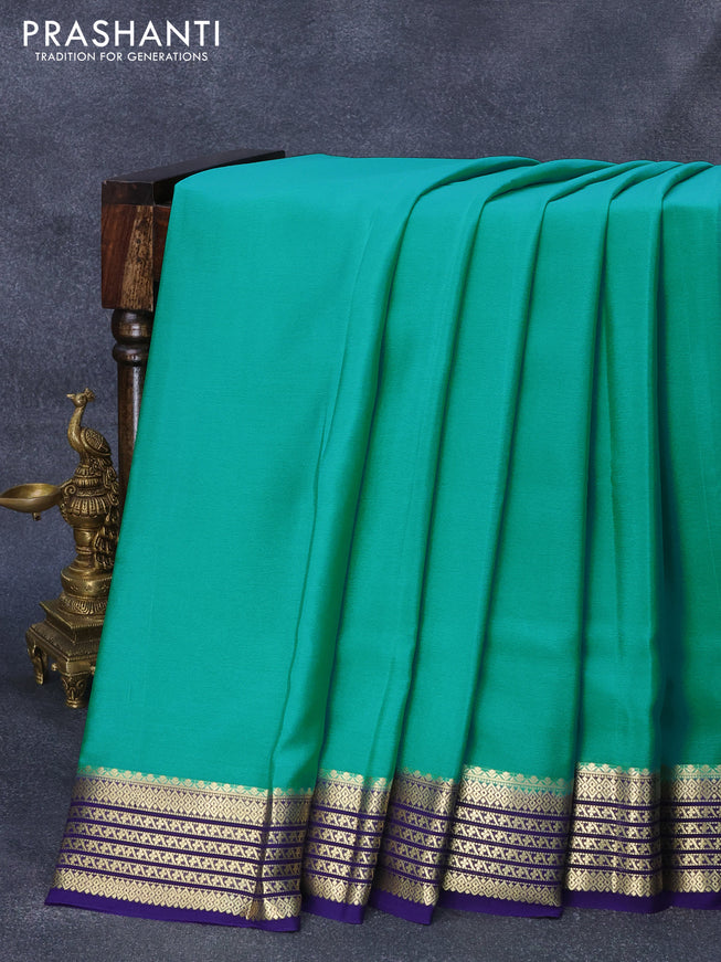 Pure mysore crepe silk saree teal green and blue with plain body and zari woven border