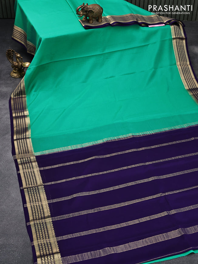Pure mysore crepe silk saree teal green and blue with plain body and zari woven border