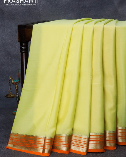 Pure mysore crepe silk saree pale yellow and orange with plain body and zari woven border