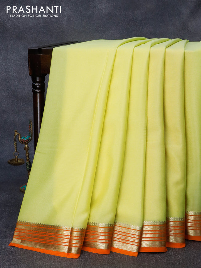 Pure mysore crepe silk saree pale yellow and orange with plain body and zari woven border
