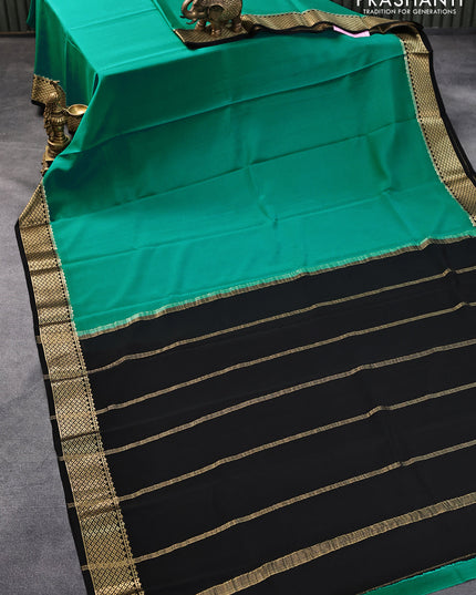 Pure mysore crepe silk saree teal green and black with plain body and zari woven border