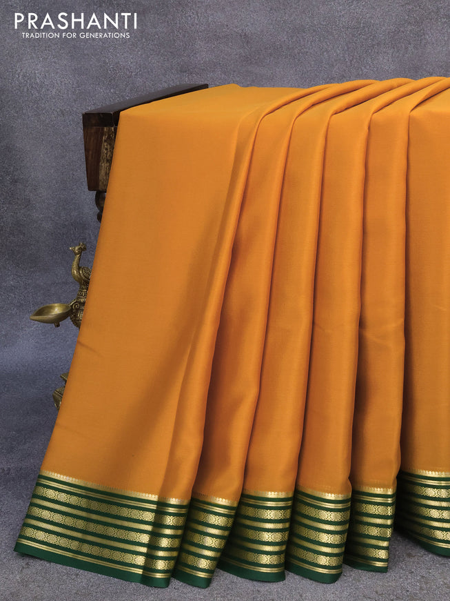 Pure mysore crepe silk saree dark mustard and green with plain body and zari woven border