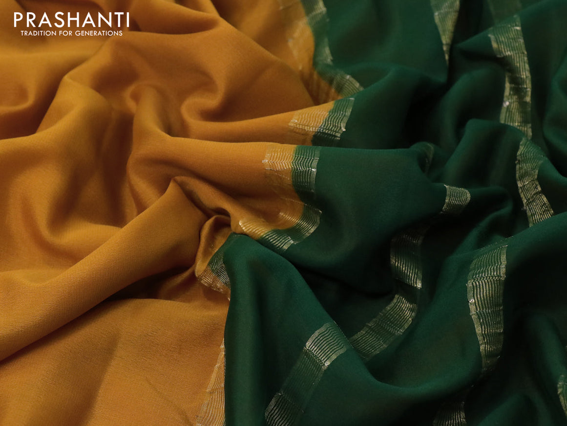 Pure mysore crepe silk saree dark mustard and green with plain body and zari woven border