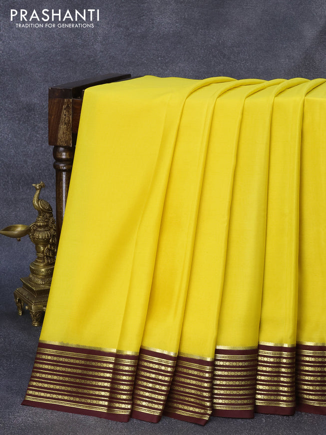 Pure mysore crepe silk saree yellow and brown with plain body and zari woven border