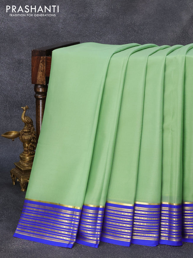 Pure mysore crepe silk saree pastel green and royal blue with plain body and zari woven border