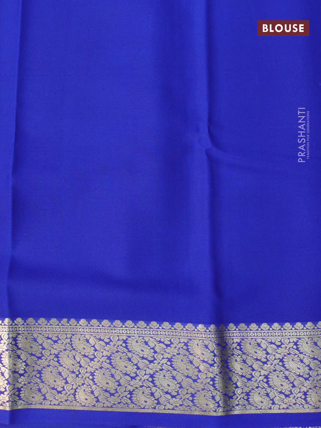 Pure mysore crepe silk saree bottle green and blue with plain body and paisley zari woven border