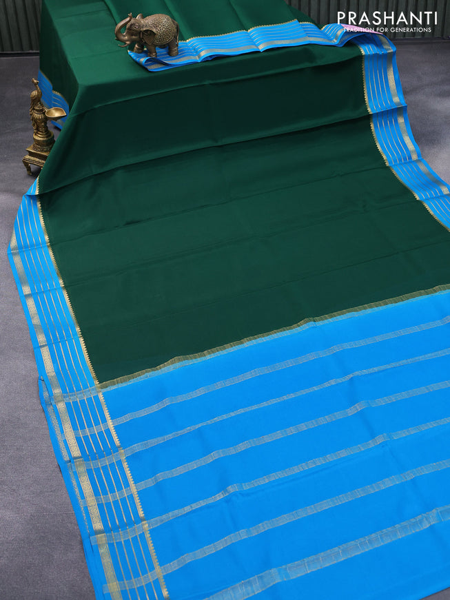 Pure mysore crepe silk saree dark green and cs blue with plain body and zari woven border