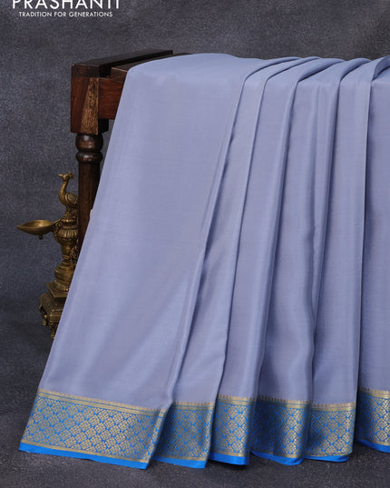 Pure mysore crepe silk saree grey and blue with plain body and zari woven border