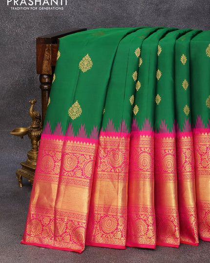 Pure gadwal silk saree green and pink with zari woven buttas and temple design long zari woven border