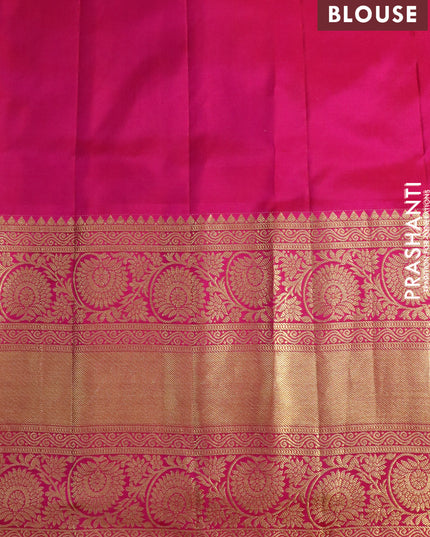 Pure gadwal silk saree dual shade of bluish green and pink with zari woven buttas and temple design long zari woven border