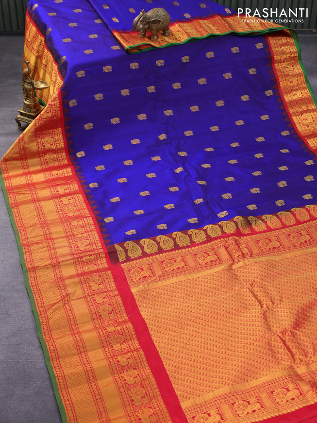 Pure gadwal silk saree blue and red with annam zari woven buttas and temple design long zari woven border