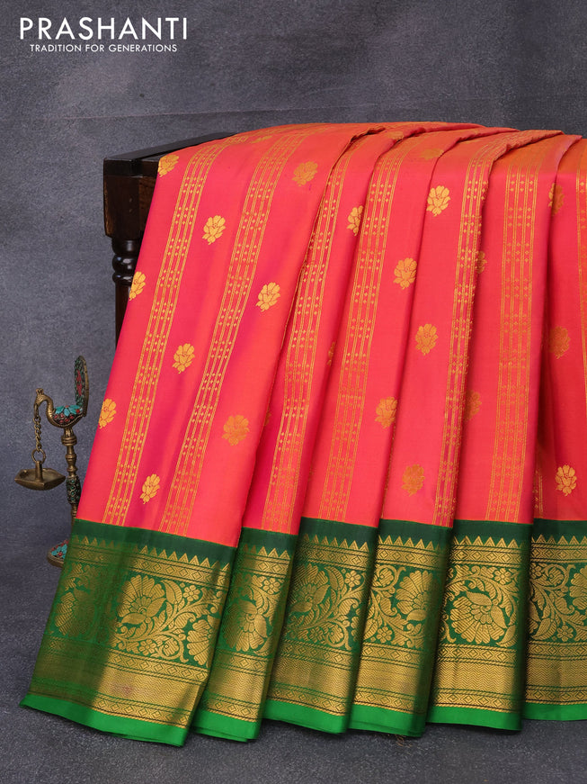 Pure gadwal silk saree dual shade of pink and green with allover zari weaves & floral buttas and rich floral zari woven border