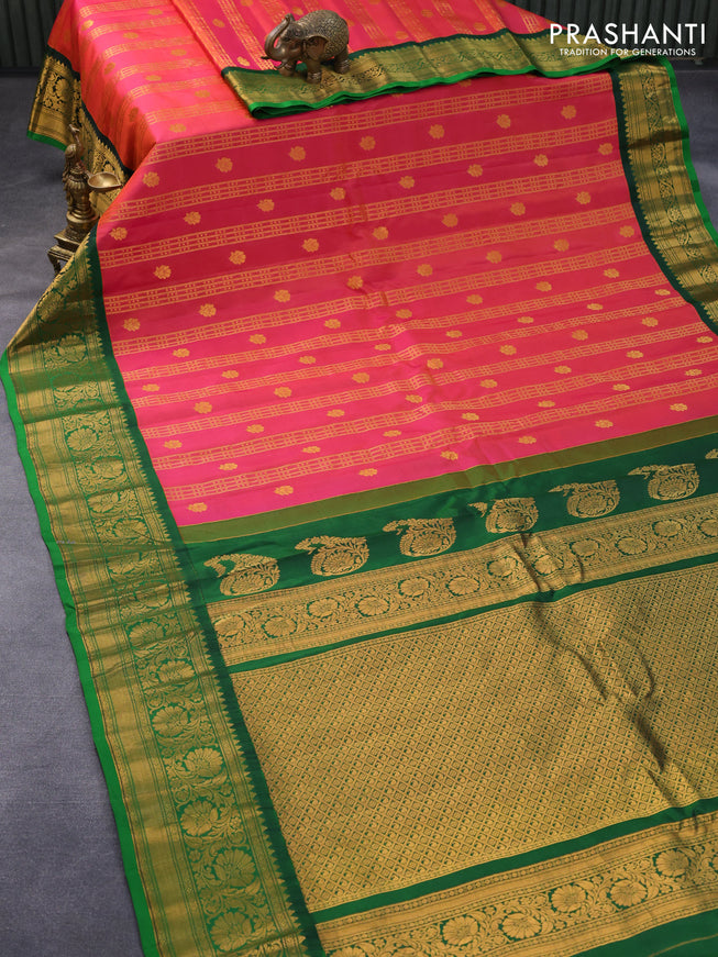 Pure gadwal silk saree dual shade of pink and green with allover zari weaves & floral buttas and rich floral zari woven border
