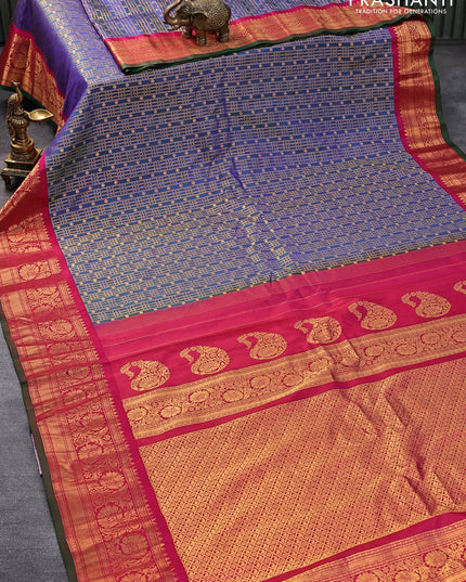 Pure gadwal silk saree dual shade of bluish green and pink with allover zari weaves and zari woven floral border