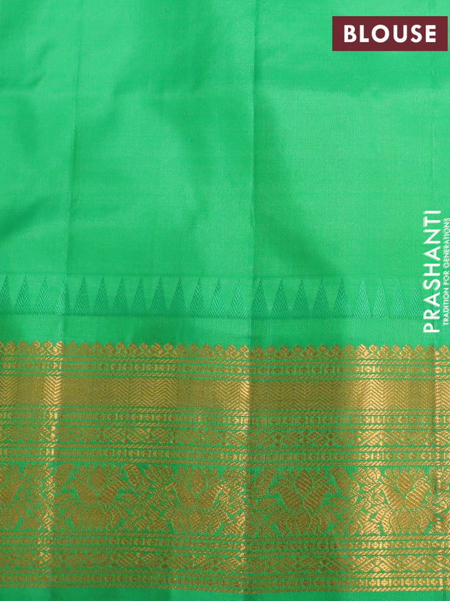 Pure gadwal silk saree light blue and light green with zari woven buttas and temple design zari woven border