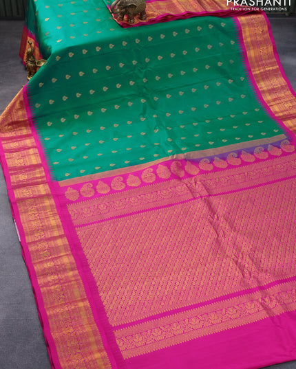 Pure gadwal silk saree teal green and pink with zari woven buttas and temple woven zari border