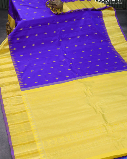 Pure gadwal silk saree blue and yellow with zari woven buttas and temple woven zari border
