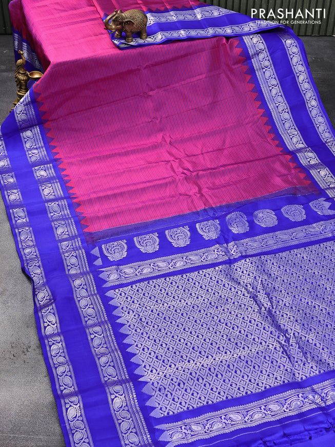 Pure gadwal silk saree pink and royal blue with allover stripes pattern and temple design rettapet silver zari woven border