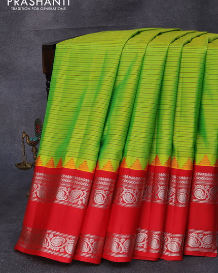 Pure gadwal silk saree lime green and red with allover stripes pattern and temple design rettapet silver zari woven border
