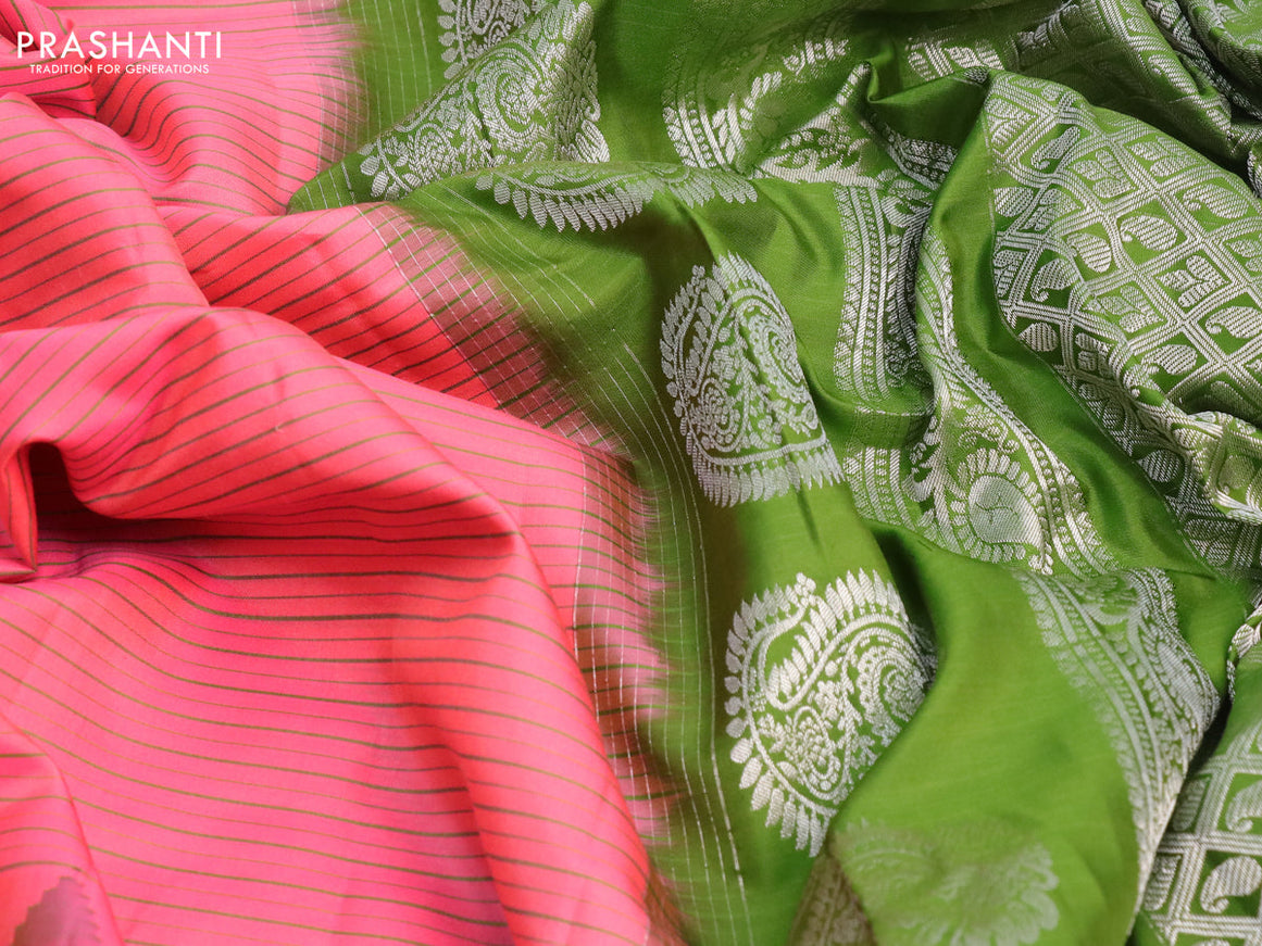 Pure gadwal silk saree peach pink and sap green with allover stripes pattern and temple design rettapet silver zari woven border