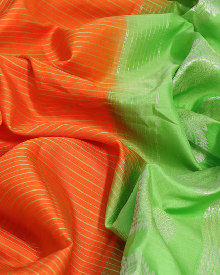 Pure gadwal silk saree orange and light green with allover stripes pattern and temple design rettapet silver zari woven border