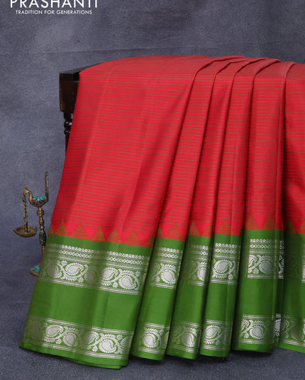Pure gadwal silk saree red and sap green with allover stripes pattern and temple design rettapet silver zari woven border