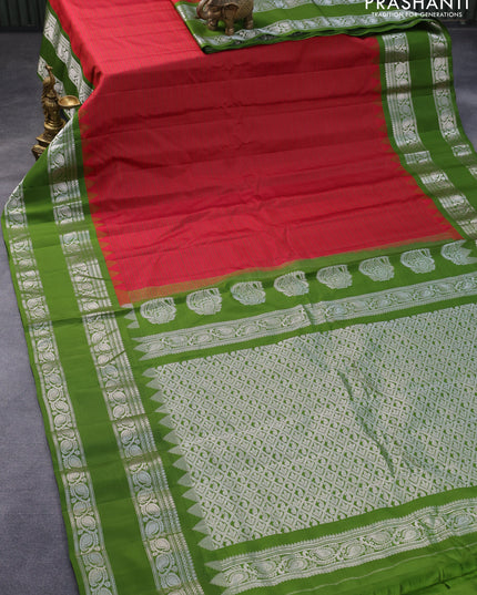 Pure gadwal silk saree red and sap green with allover stripes pattern and temple design rettapet silver zari woven border
