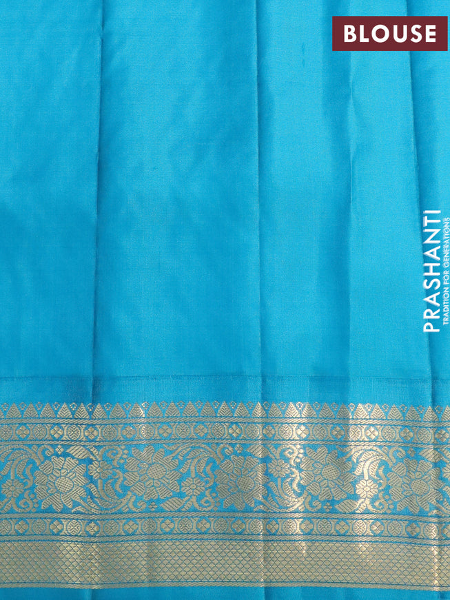 Pure gadwal silk saree dual shade of mustard yellowish pink and teal blue with allover zari checked pattern & buttas and floral zari woven border