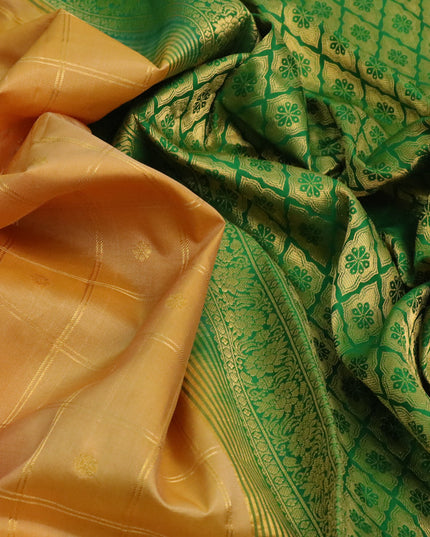 Pure gadwal silk saree sandal and green with allover zari checked pattern & buttas and floral zari woven border