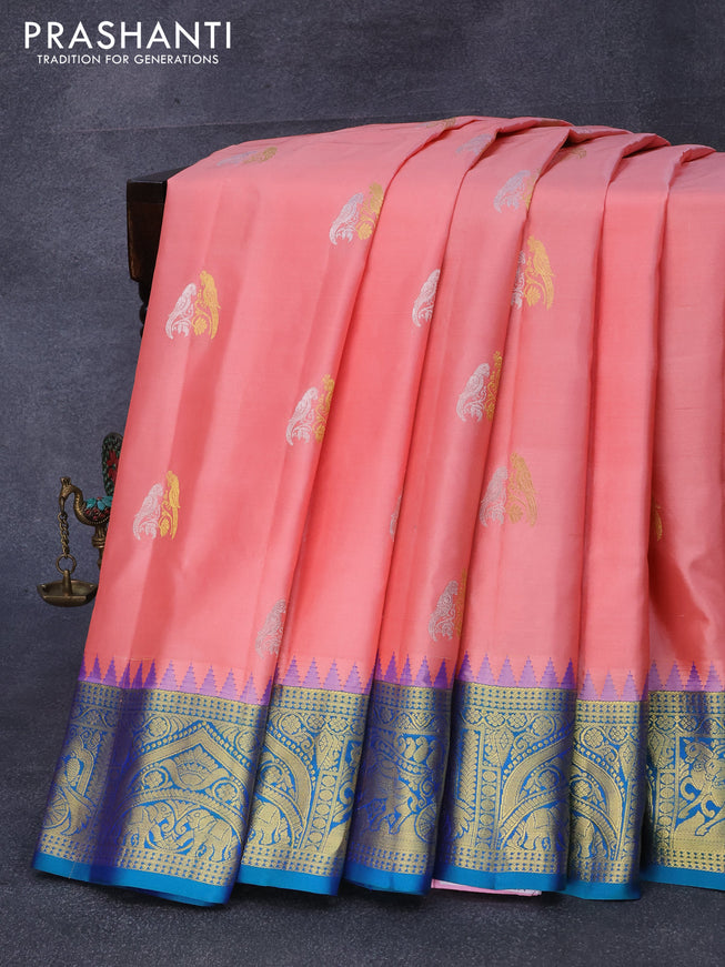 Pure gadwal silk saree peach orange and dual shade of blue with silver & gold zari woven parrot buttas and zari woven elephant design border