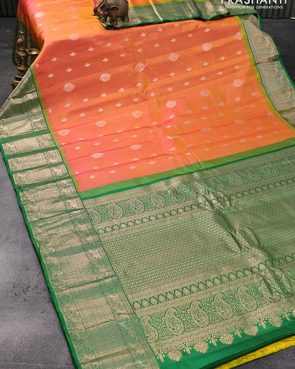 Pure gadwal silk saree dual shade of yellowish pink and green with zari woven buttas and temple design zari woven border
