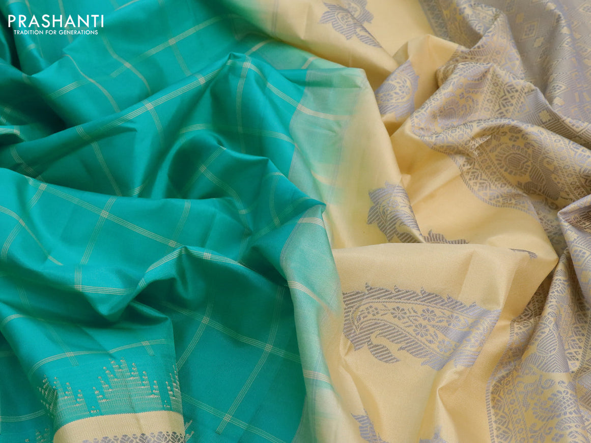 Pure gadwal silk saree teal blue and sandal with allover checked pattern and temple design thread woven border