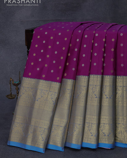 Pure gadwal silk saree purple and cs blue with silver & gold zari woven floral buttas and long zari woven border