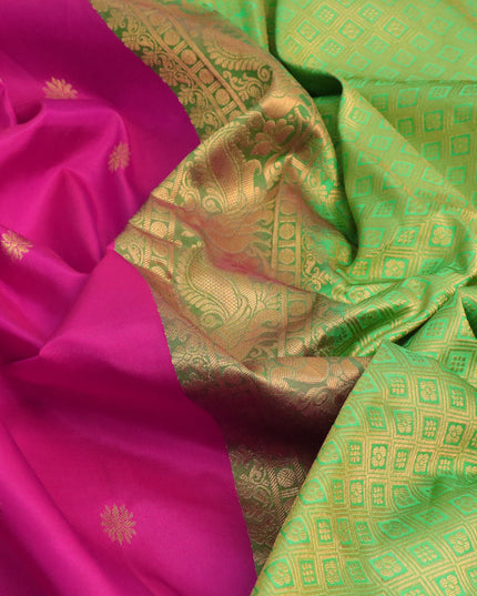 Pure gadwal silk saree pink and light green with allover zari woven floral buttas and temple design annam zari woven border