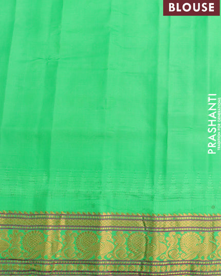Pure gadwal silk saree pink and light green with allover zari woven floral buttas and temple design annam zari woven border