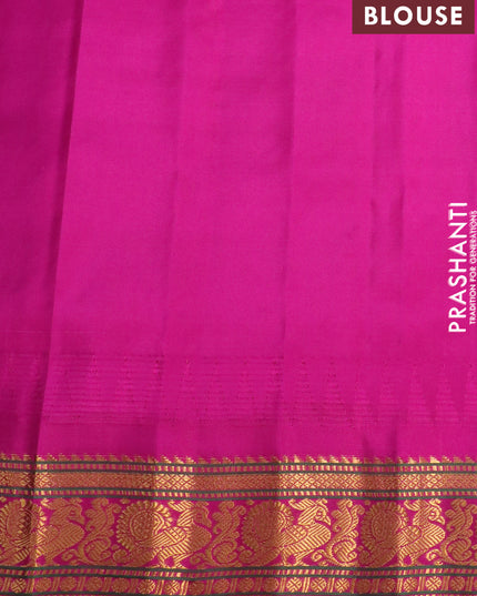 Pure gadwal silk saree blue and pink with allover zari woven floral buttas and temple design annam zari woven border