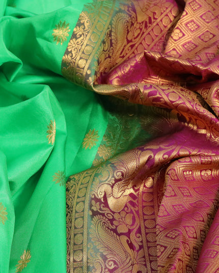 Pure gadwal silk saree parrot green and dark magenta pink with zari woven floral buttas and temple design annam zari woven border