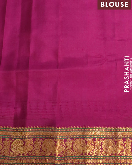 Pure gadwal silk saree parrot green and dark magenta pink with zari woven floral buttas and temple design annam zari woven border