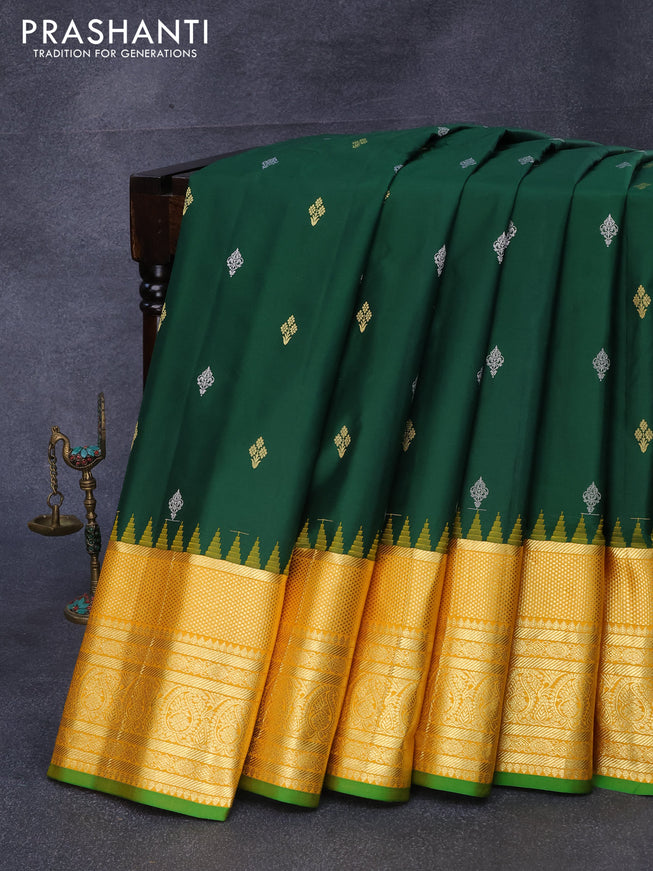 Pure gadwal silk saree green and mustard yellow with silver & gold zari woven buttas and temple design long zari woven border