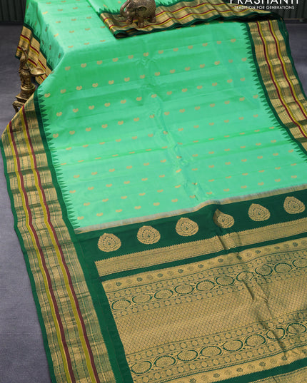 Pure gadwal silk saree teal green and green with paisley zari woven buttas and temple design zari woven border