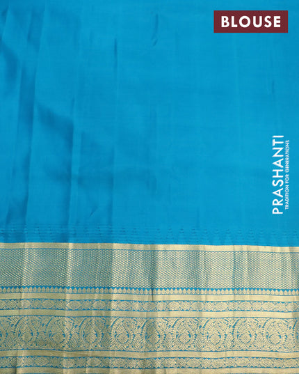 Pure gadwal silk saree orange and cs blue with silver & gold zari woven buttas and temple design zari woven border