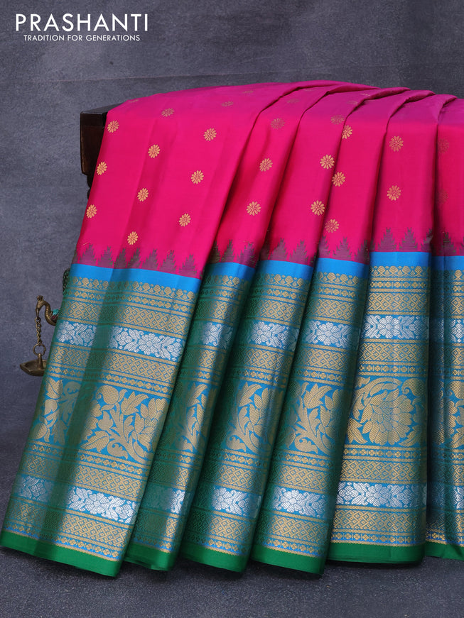 Pure gadwal silk saree dual shade of pink and dual shade of cs blue with zari woven floral buttas and temple design long zari woven border