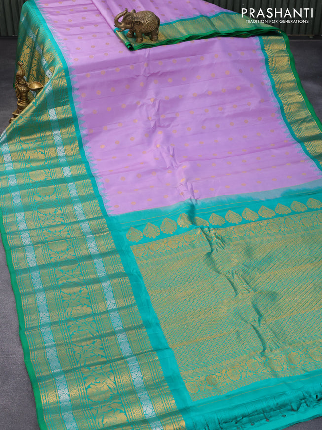Pure gadwal silk saree pastel lavender and green with zari woven floral buttas and temple design zari woven border