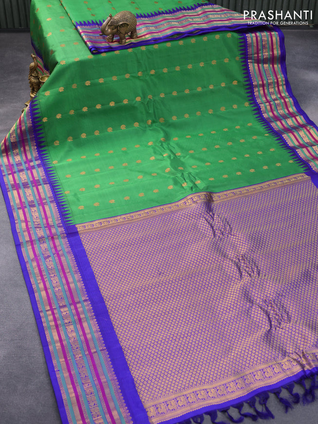 Pure gadwal silk saree green and blue with annam zari woven buttas and temple design annam zari woven border