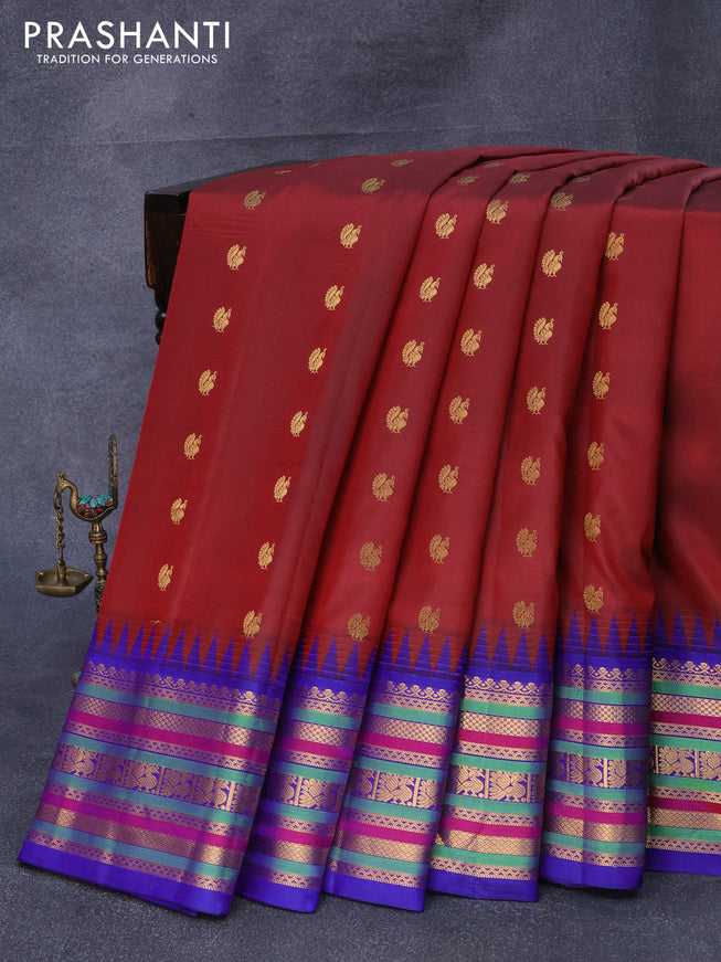 Pure gadwal silk saree maroon and blue with annam zari woven buttas and temple design annam zari woven border